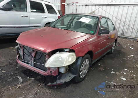 1999 Honda Civic Lx z USA, uszkodzony, nr VIN 1HGEJ6676XL034402